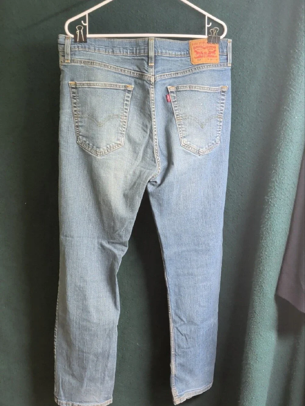 Levi's light blue denim jeans with tan leather patch
